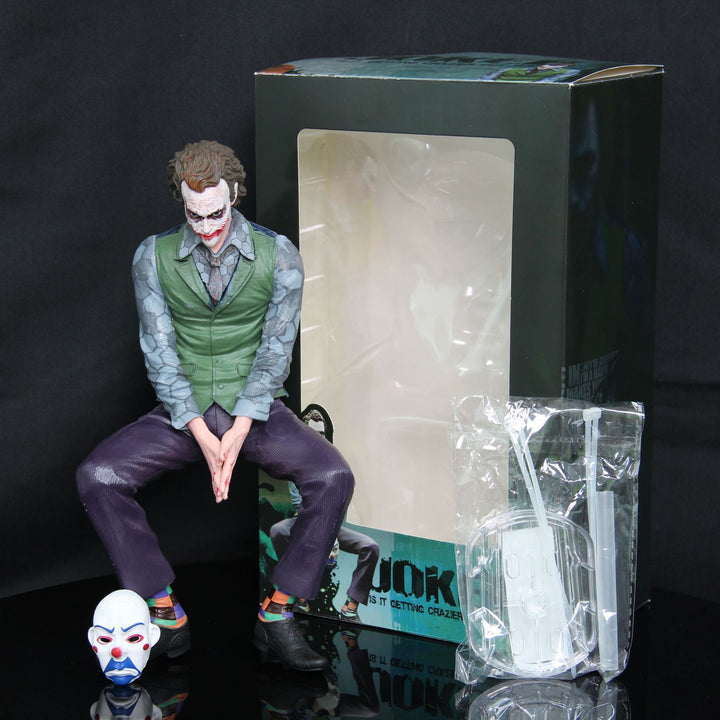 Joker Heath Ledger sitting doll