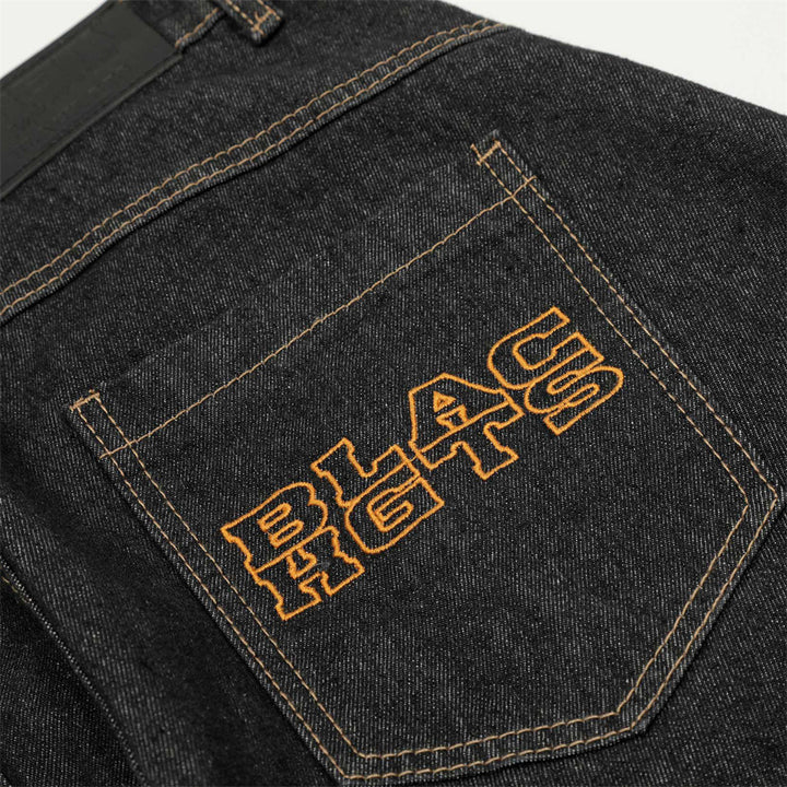 Inverted design scimitar jeans