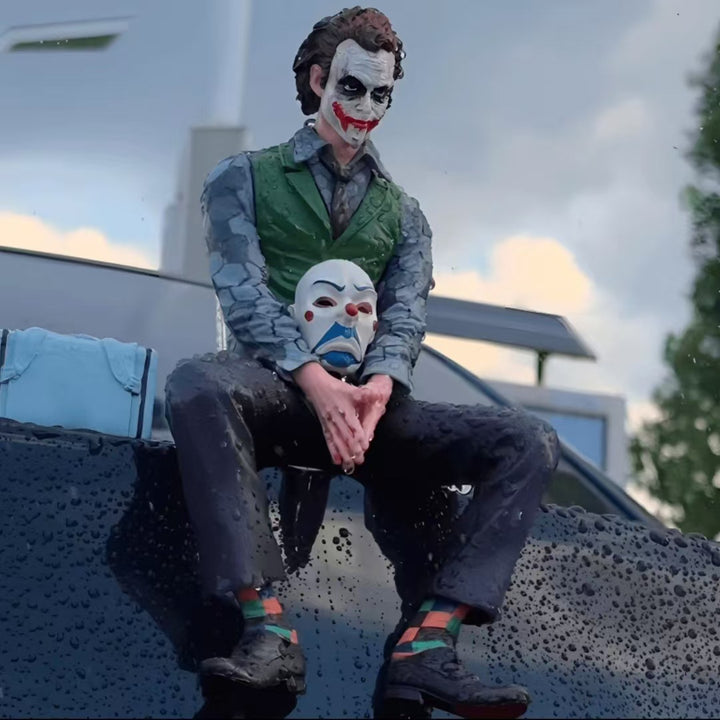 Joker Heath Ledger sitting doll